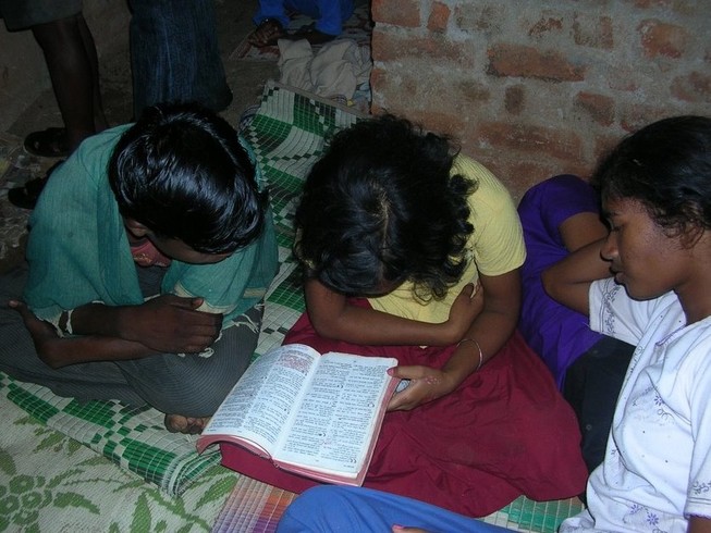 Indian Christian girls reading the Bible together. At least 4,000 girls have been reported to have been lured by Islamists into abusive marriages and forced to convert to Islam in the past 15 years
