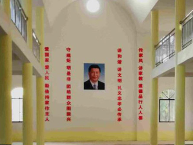 Authorities forced a church in China to display a portrait of Xi Jinping in a prominent position and surround it with communist slogans. [Image credit: Bitter Winter]