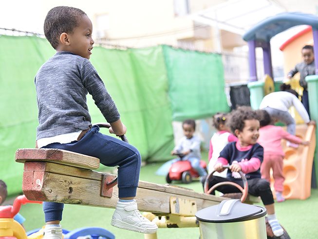 Eritrean Christian children playing in a refugee camp school supported by Barnabas
